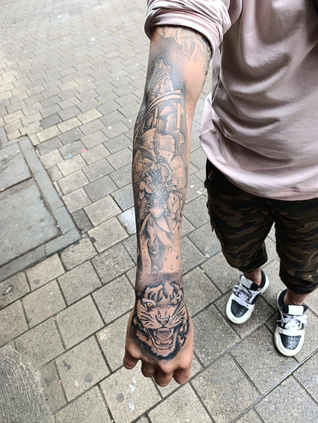 Knight and tiger sleeve tattoo